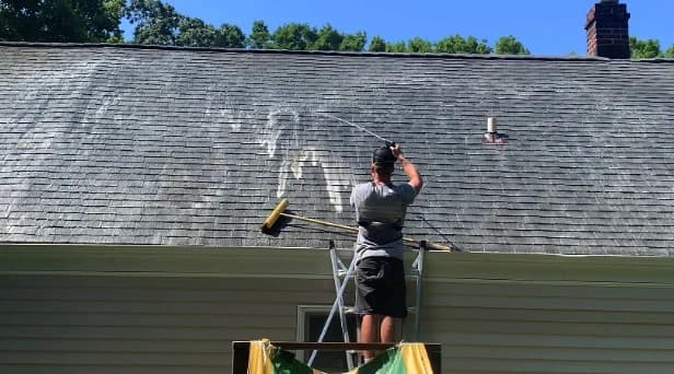 Before and after results of roof washing by Avon Lake Power Washing in Avon Lake